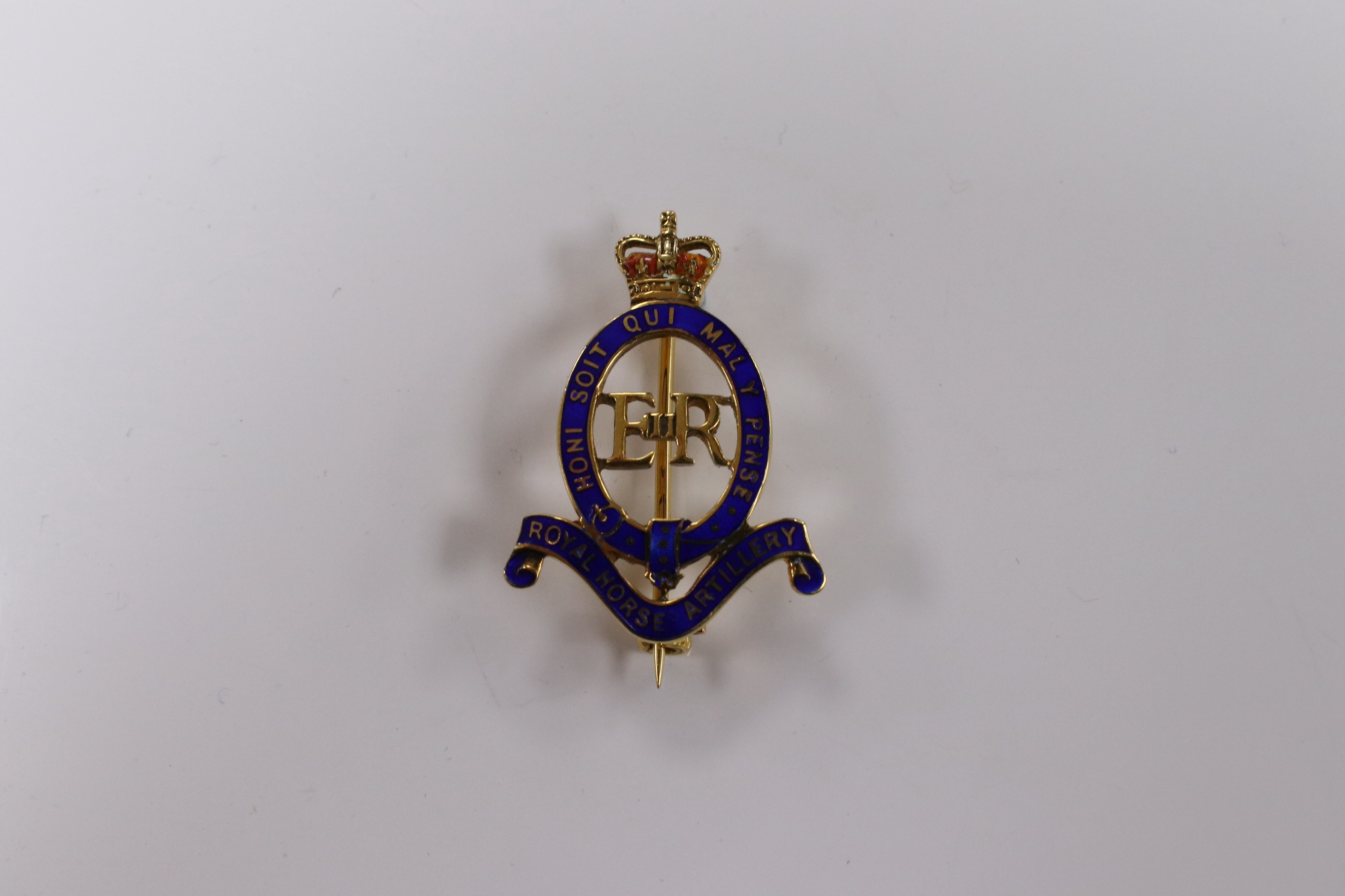 An Elizabeth II 9ct gold and enamel Royal Horse Artillery sweethearts brooch, 28mm, gross weight 4.4 grams. Condition - poor to fair